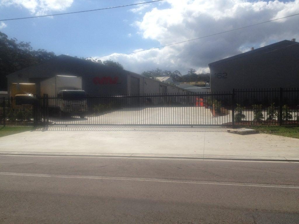 13.5m wide x 2.1m high fully automated, remote controlled opening, sliding