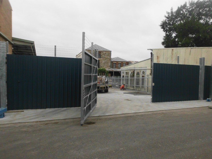 swinging bi folding gates - Chainwire Fencing Newcastle