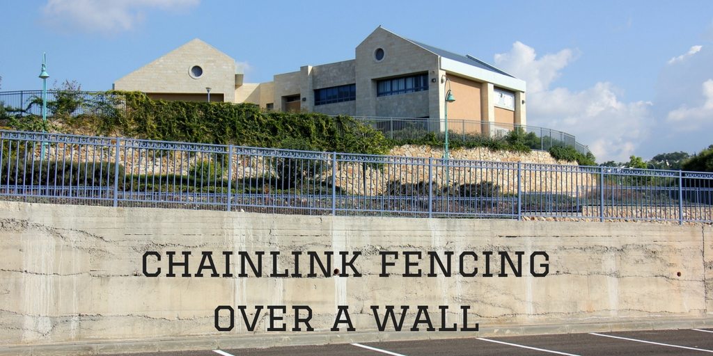 chainlink fencing over a wall - Chainwire Fencing Newcastle