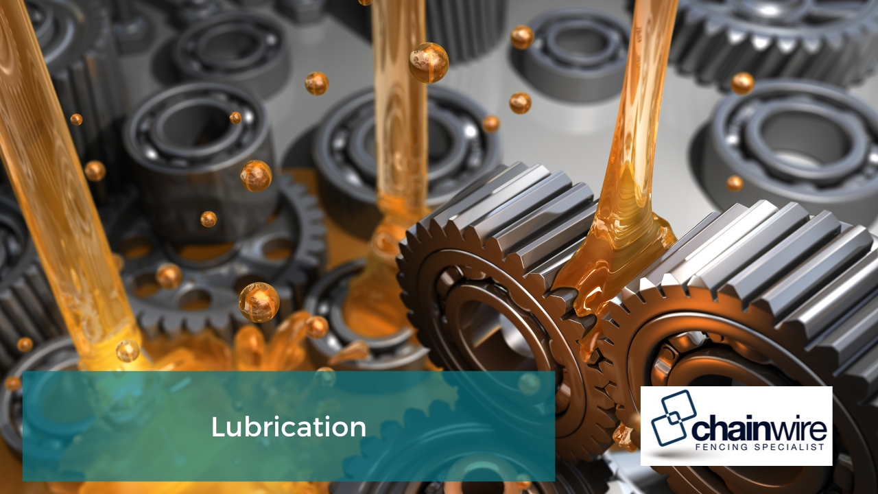 Lubrication for chainwire fencing