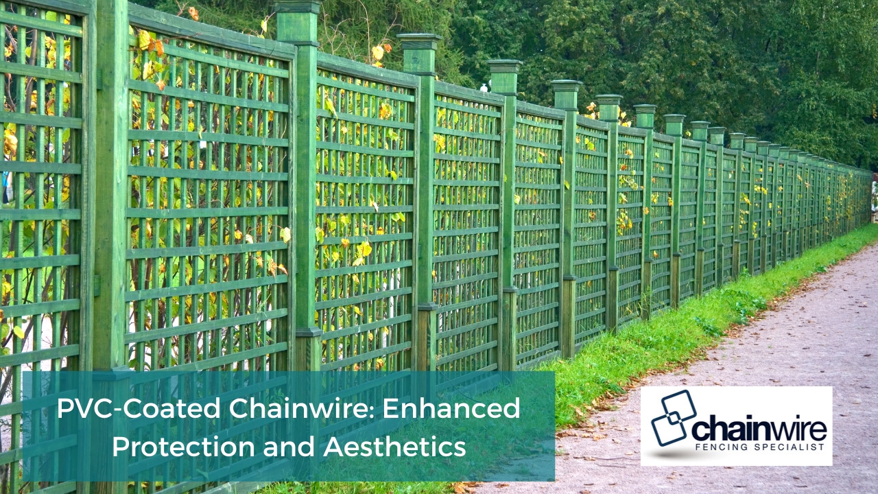 long, green wooden fence with a lattice pattern