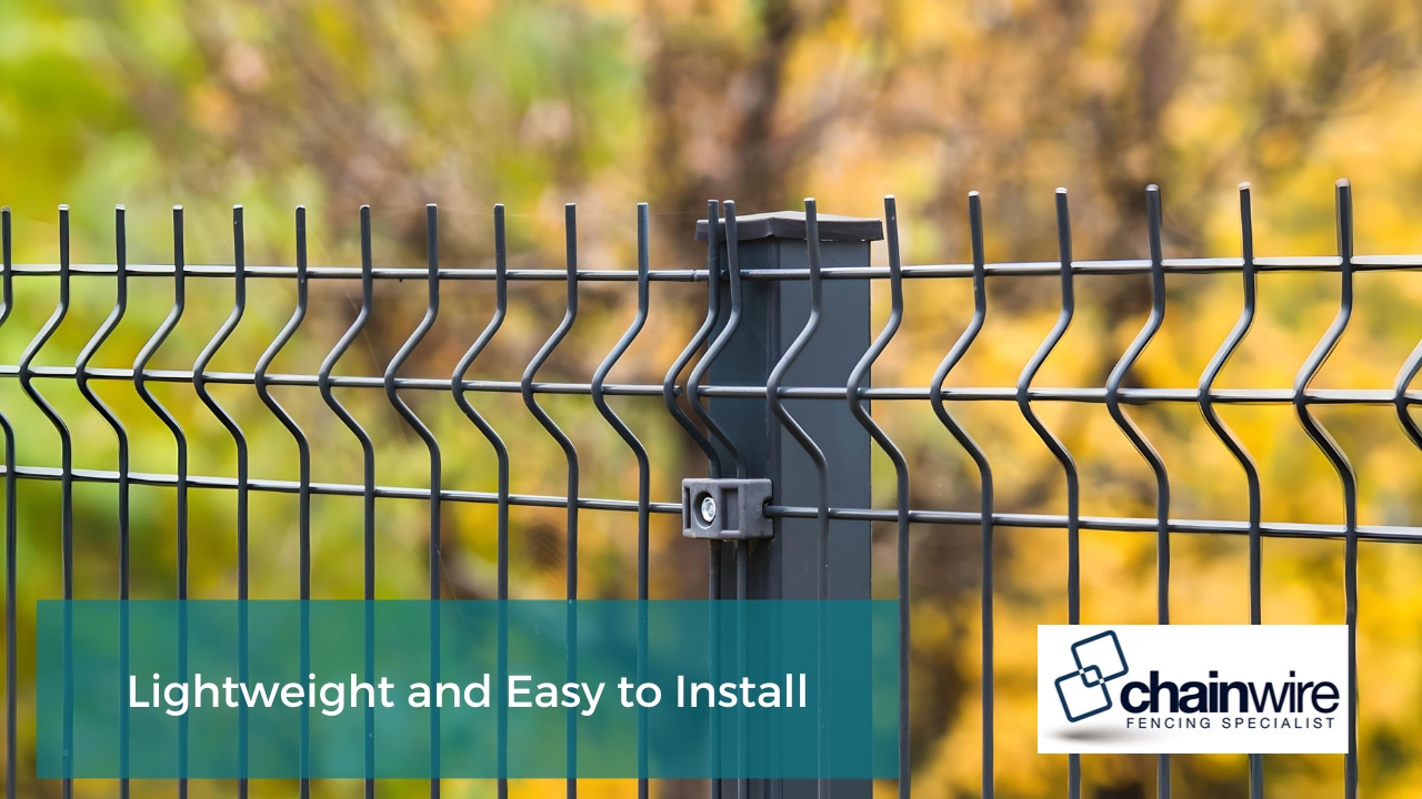 Durable black aluminium fencing securing a property, providing safety and a backdrop for enjoying wine outdoors.